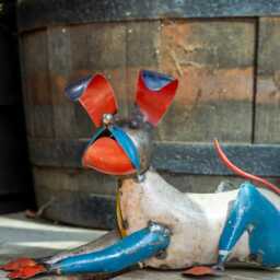 Upcycled Tin Lying Dog Sculpture - Handcrafted Recycled Metal Art - thumbnail 2