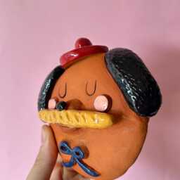 Handmade Glazed Ceramic Dog Wall Decor French Style Baguette Art - thumbnail 3