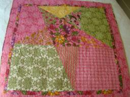 Whimsical Star Quilted Wall Hanging in An Olive Theme, Vibrant Pinks & Greens Showcase This Santorini Line Of Fabric By Moda - thumbnail 1
