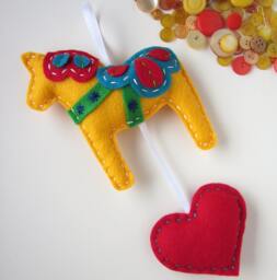 Yellow Dala Horse Wall Hanging - Handmade Swedish Folk Art Plush Eco-Friendly Felt Decoration Personalized Holiday Or Nursery Gift - thumbnail 1