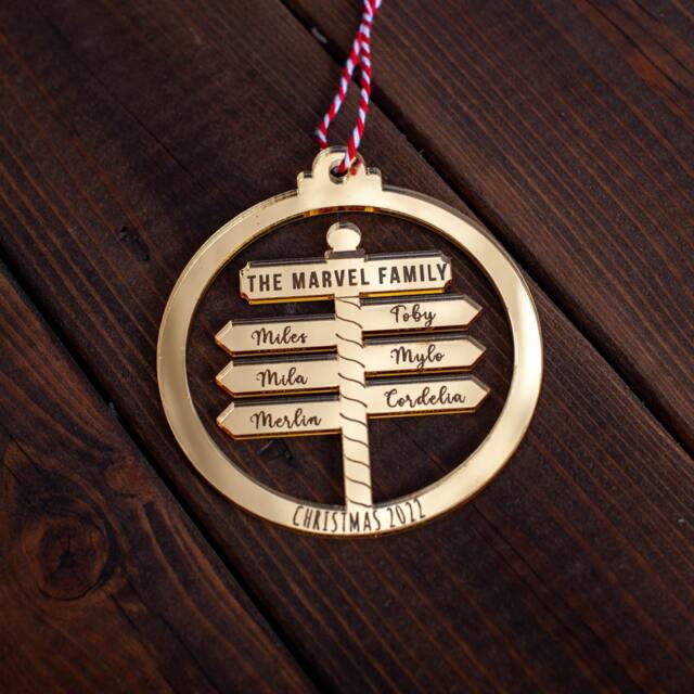 Personalised Family Christmas Bauble - Laser Cut Names On North Pole Post - image 1