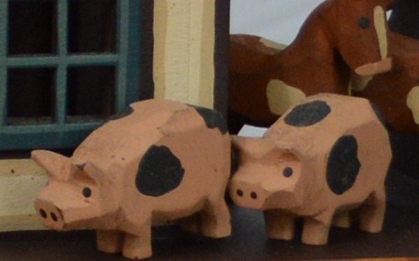 Hand Carved Wooden Pigs