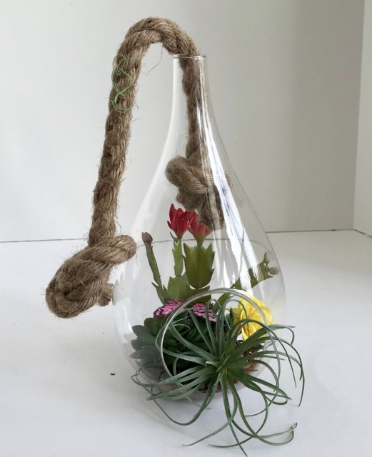 Hanging Glass Vase With Artificial Grass Succulents, Flowering Cactus, Yellow Flowers & Purple Butterfly - image 1