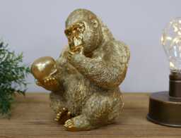 Golden Philosopher Gorilla Ornament With Skull