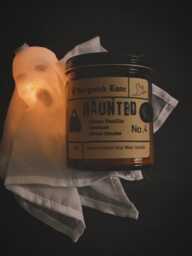 Haunted Smoked Vanilla Candle - Spooky Ghost Halloween Decor Dark Academia Home Fragrance Moody Goth Aesthetic, 9Oz Amber Jar - thumbnail 1