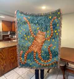 Quirky Orange Cat Woven Throw Blanket - Funny Long in Wildflower Meadow Tapestry, Weirdcore Art, Maximalist Home Decor, Tabby Gift - thumbnail 1