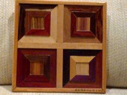 Wood Wall Art Sculpture Featuring A Variety Of Exotic Wood Pieces in Geometric Array - thumbnail 1