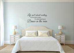 Life Isn't About Waiting For The Storm To Pass. It's Learning Dance in Rain. Vinyl Wall Decal - thumbnail 1