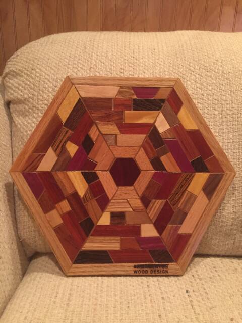 Hexagon Shaped Wood Wall Art Sculpture Featuring A Variety Of Exotic Pieces Geometrically Arrayed - image 1