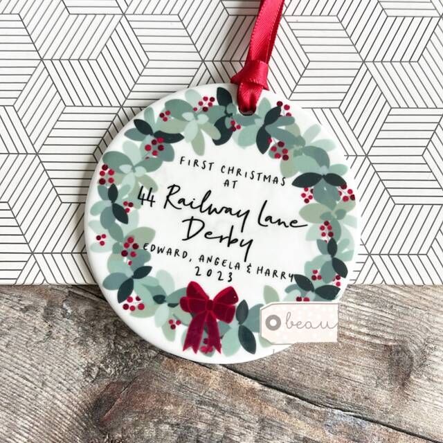 Personalised First Christmas At Address New Home Gift Holly Foliage Wreath Bow Design Ceramic Or Acrylic Round Ornament Keepsake