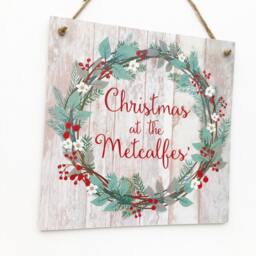 Christmas At The... Sign, Personalised Welcome Wooden Plaque, Surname Door Wreath - thumbnail 3