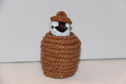 Baby Emperor Penguin in Rope Basket