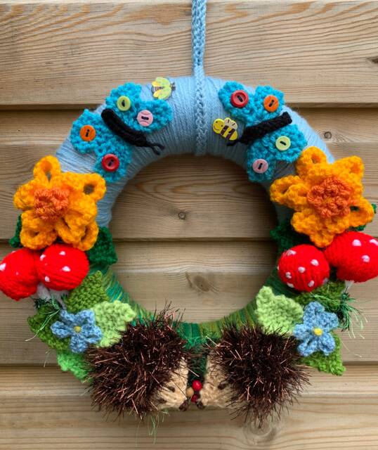 Knitted Hedgehog Wreath, Woodland Nursery Decor, Sunflower & Butterfly - image 1