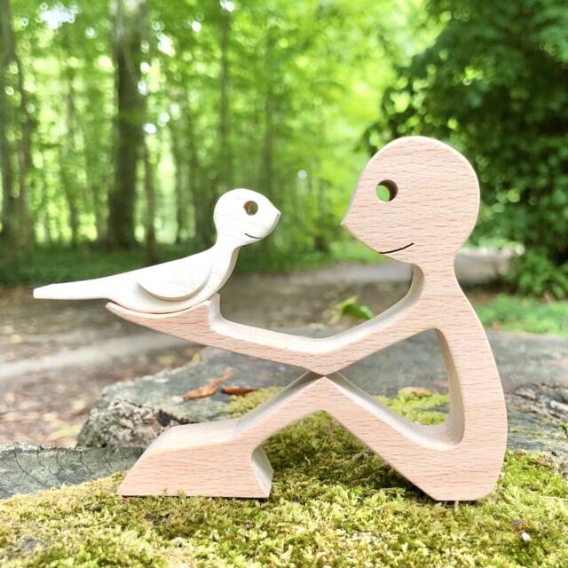 A Man Bird Wood Carving