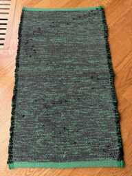 "Black Rug, Green Cotton 33"" L X 18 1/2"