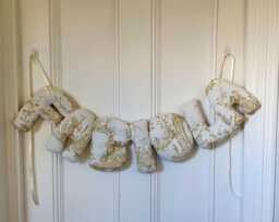 Personalised Name Banner, Toile De Jouy in Soft Gold Decor. Baby Wall Hanging. Shower Gift. Garland. Nursery - thumbnail 1