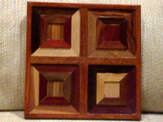 Wood Wall Art Sculpture Featuring A Variety Of Exotic Wood Pieces in Geometric Array - image 1