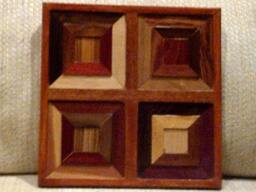 Wood Wall Art Sculpture Featuring A Variety Of Exotic Wood Pieces in Geometric Array - thumbnail 1