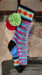 Hand Knit Christmas Stocking Blue Green Red With Snowflake Detail By Santa's Works - thumbnail 1