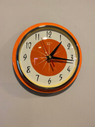 Mid Century Atomic Jetsons Style Wall Clock in In Neon Tangerine - thumbnail 1