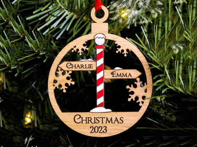 North Pole Sign Family Christmas Tree Decoration, Up To 7 Names, Personalised Xmas Bauble - image 1