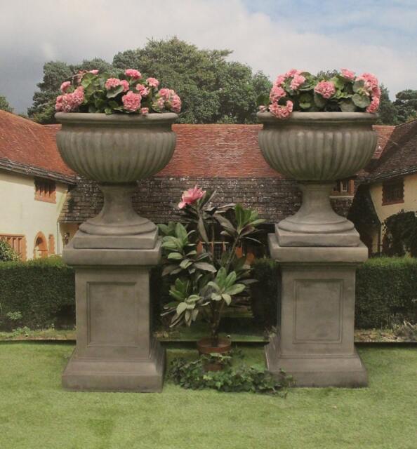 Pair Of Royal Sussex Urns On Panel Plinths - image 1
