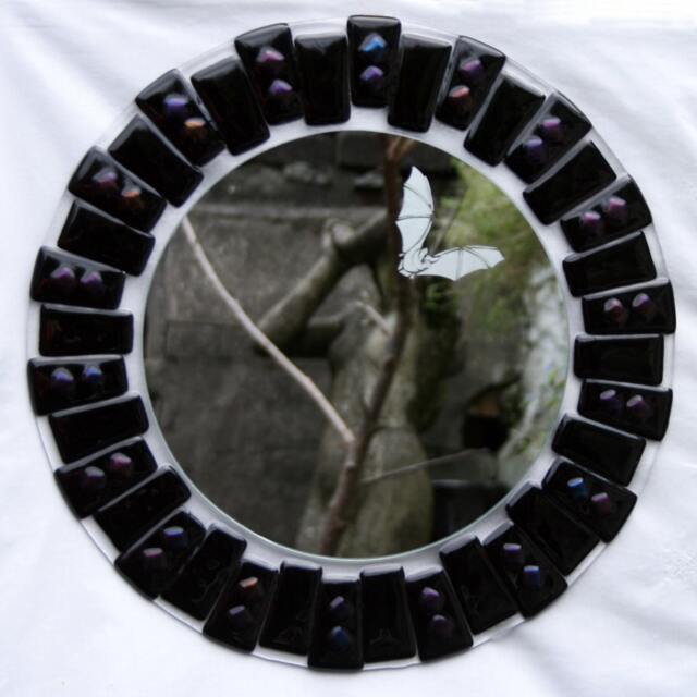 Night Flight ~ A Fused Glass Circular Mirror in Glossy Black With Shimmering Highlights Of Purples & Blue, Etched A Flying Bat