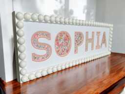 Personalised White Bobbin Name Frame With Pink Floral Liberty Fabric, New Baby Gift, Children's Christening & Christmas, Keepsake - thumbnail 1