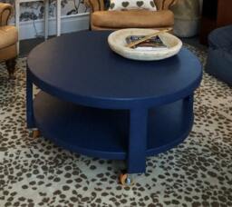 Custom Upholstered Round Table With Shelf