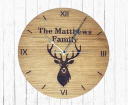 Personalised Oak Veneer Wall Clock Engraved Stag Design, Family Name - thumbnail 1