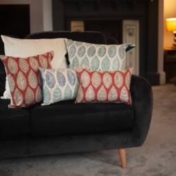 Indira Leaf Print Boudoir Cushion. Scarlet Red Indonesian Inspired Block-Print Botanical Design. Eco-Friendly Cotton. 17x12 - thumbnail 3