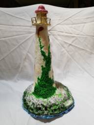 Handmade Weathered Lighthouse With Land Base - thumbnail 1