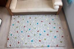 Natural Pebble Rug, Felt With Stone Shape Marble Tan Shade Wool Pom Balls For Room Decor - thumbnail 1