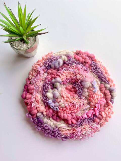 Pretty in Pink & Purple 12-Inch Round Woven Wall Hanging - image 1