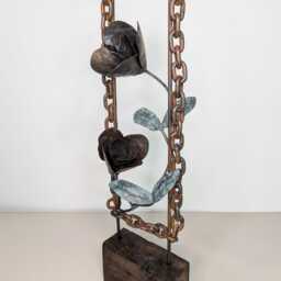 Metal Flower Sculpture Made Of Reclaimed Materials - thumbnail 4