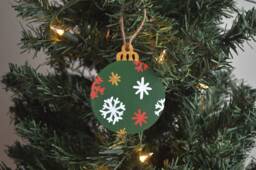 Hand Painted Snowflake Wooden Christmas Ornament - thumbnail 1