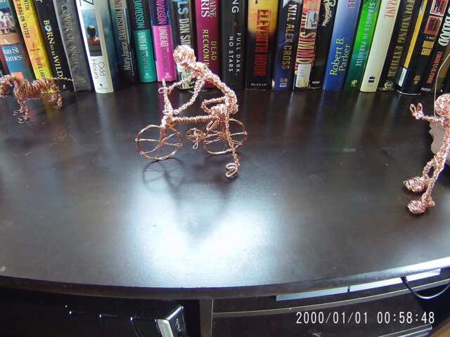Twisted Person Getting On A Bike - image 1