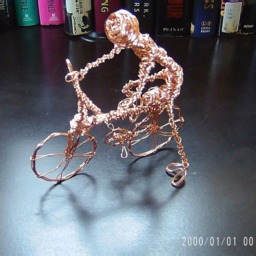 Twisted Person Getting On A Bike - thumbnail 4