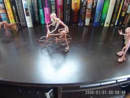 Twisted Person Getting On A Bike - thumbnail 1
