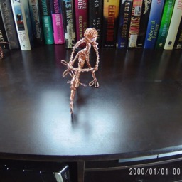 Twisted Person Getting On A Bike - thumbnail 2