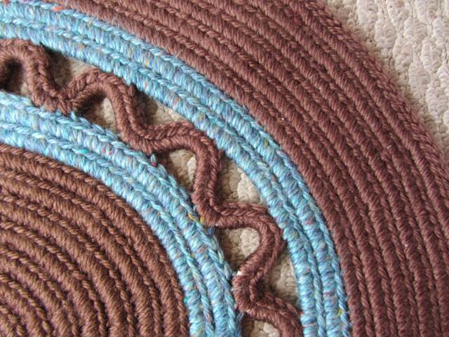 Crocheted Round Rug in Brown & Blues - image 1