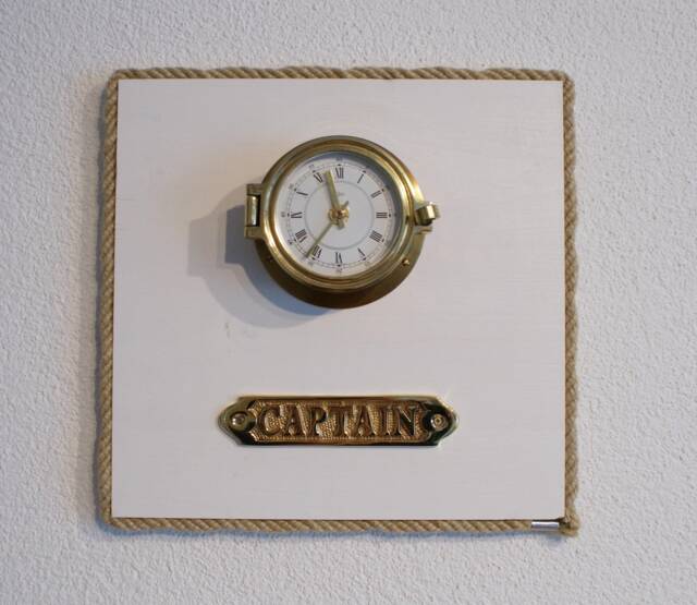 Ship's Clock in The Porthole Of Captain - image 1
