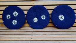 Handfelted Seat Cushion With White Wheels, Dark Blue