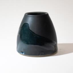 Hand Thrown Vase Form Stoneware Fired in A Satin Finish Semi-Matte Black Glaze With High Gloss Blue Volcanic Splash - thumbnail 1