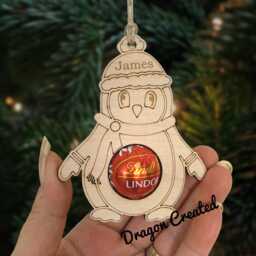 Personalised Penguin Chocolate Christmas Ornament Wooden Bauble, Holder Lindor - thumbnail 1