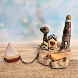 Handmade Ceramic Sculpture Of A Little Village With Houses, Lighthouse, Tree, Bird & Miniature Boat, Whimsical Gift Art - thumbnail 2