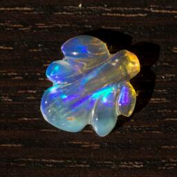 Crystal Opal Turquoise Purple Flashing Wing Carving - 1.6 Cts