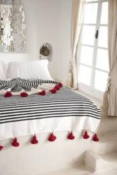 Handmade Moroccan Cotton Blanket With Pom Poms, Black Stripes - thumbnail 1