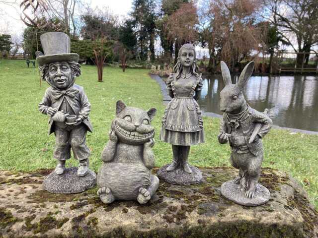 Set Of 4 Resin Alice in Wonderland Figure Ornaments - Alice, Mad Hatter, White Rabbit & Cheshire Cat - image 1