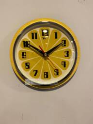 Honeydew Yellow Atomic Wall Clock Mid-Century Jetsons Style - thumbnail 1